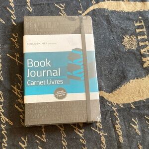 Moleskine Book Journal with embossed cover. New in shrink wrap.